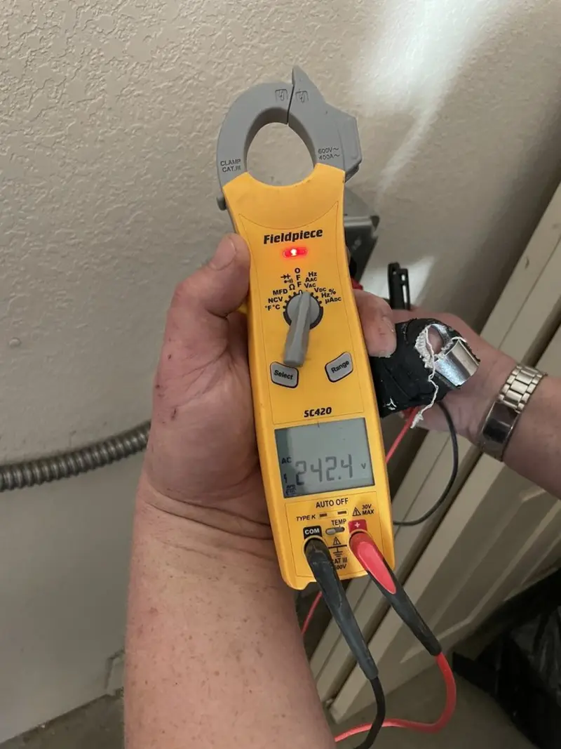 Voltage testing with clamp meter during Hot Tub / Pool Electrical Wiring in Greenwood